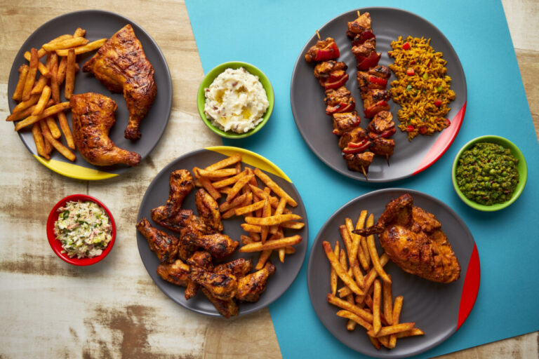 Plates of chicken and sides