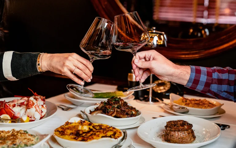 People dining and drinking wine together